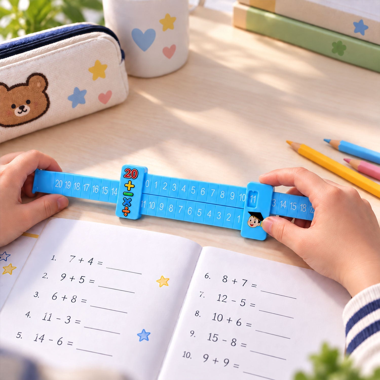 A child's hands manipulate a blue plastic sliding math ruler over an open workbook with arithmetic problems.
