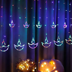 Vibrant multicolor Diya Curtain String Lights illuminating a festive window.
