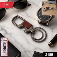 Stylish metal key holder with safety lock clip attached to belt loop