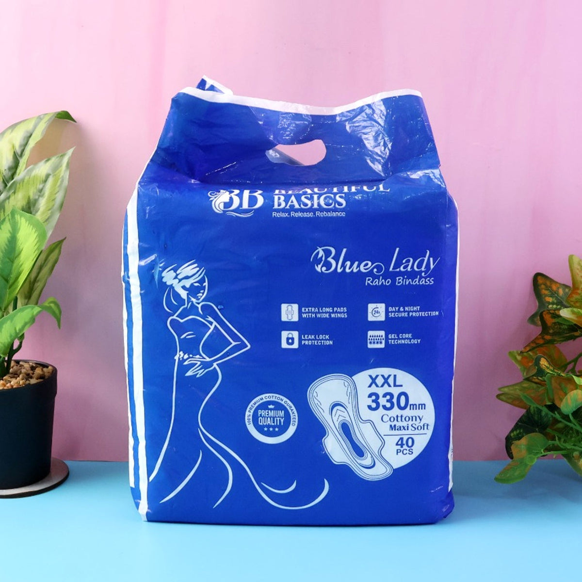 A close-up of a DeoDap Sanitary Pads 330mm pack, highlighting the 'Blue Lady' branding and 'Extra Long' feature.