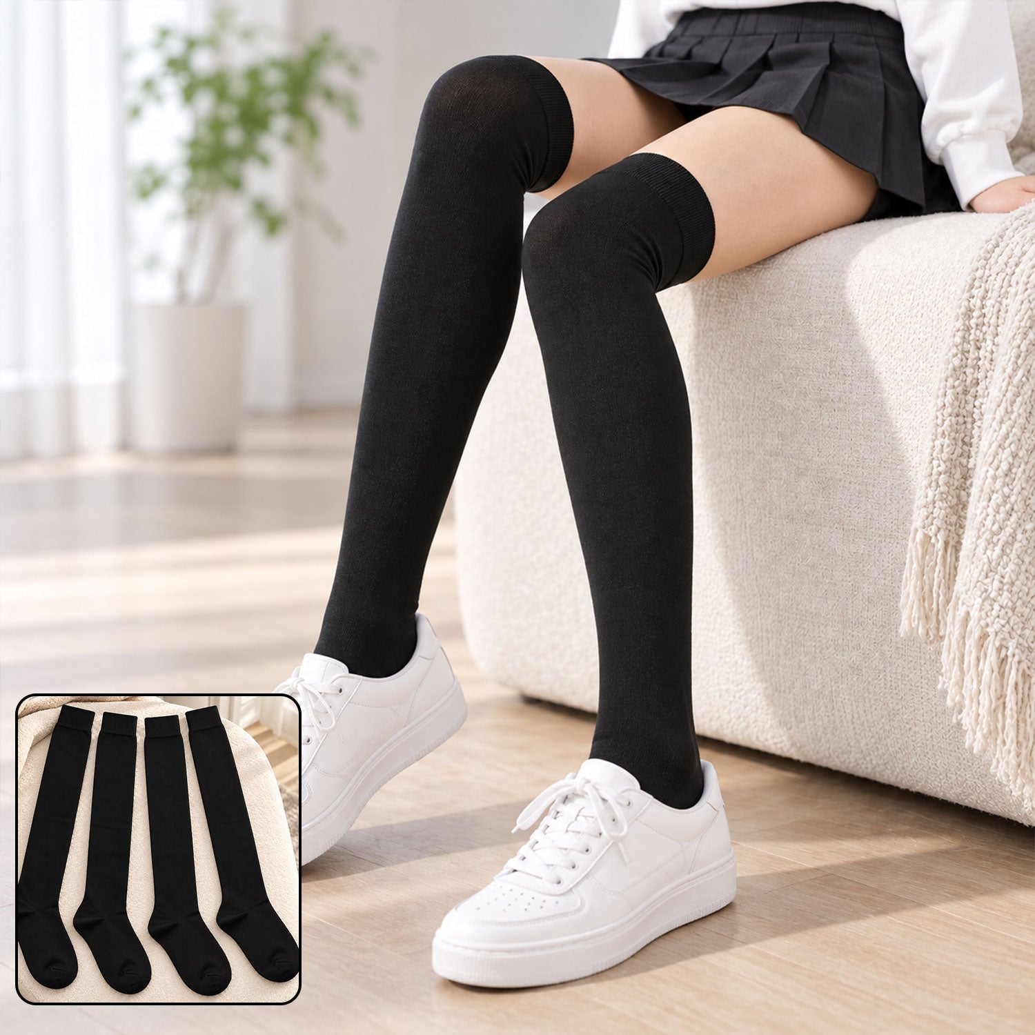 A person sitting on a sofa, wearing black over-knee socks and white sneakers, with an inset of four black socks. â€“ view 3