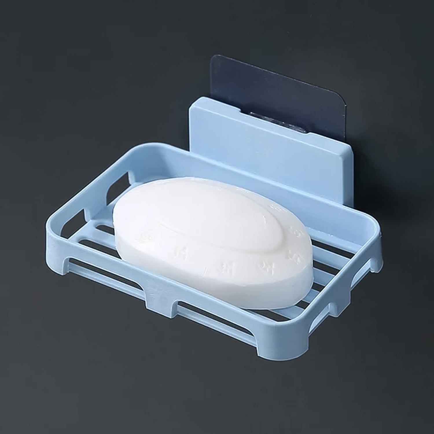 Soap holder with soap and sponge in kitchen setting
