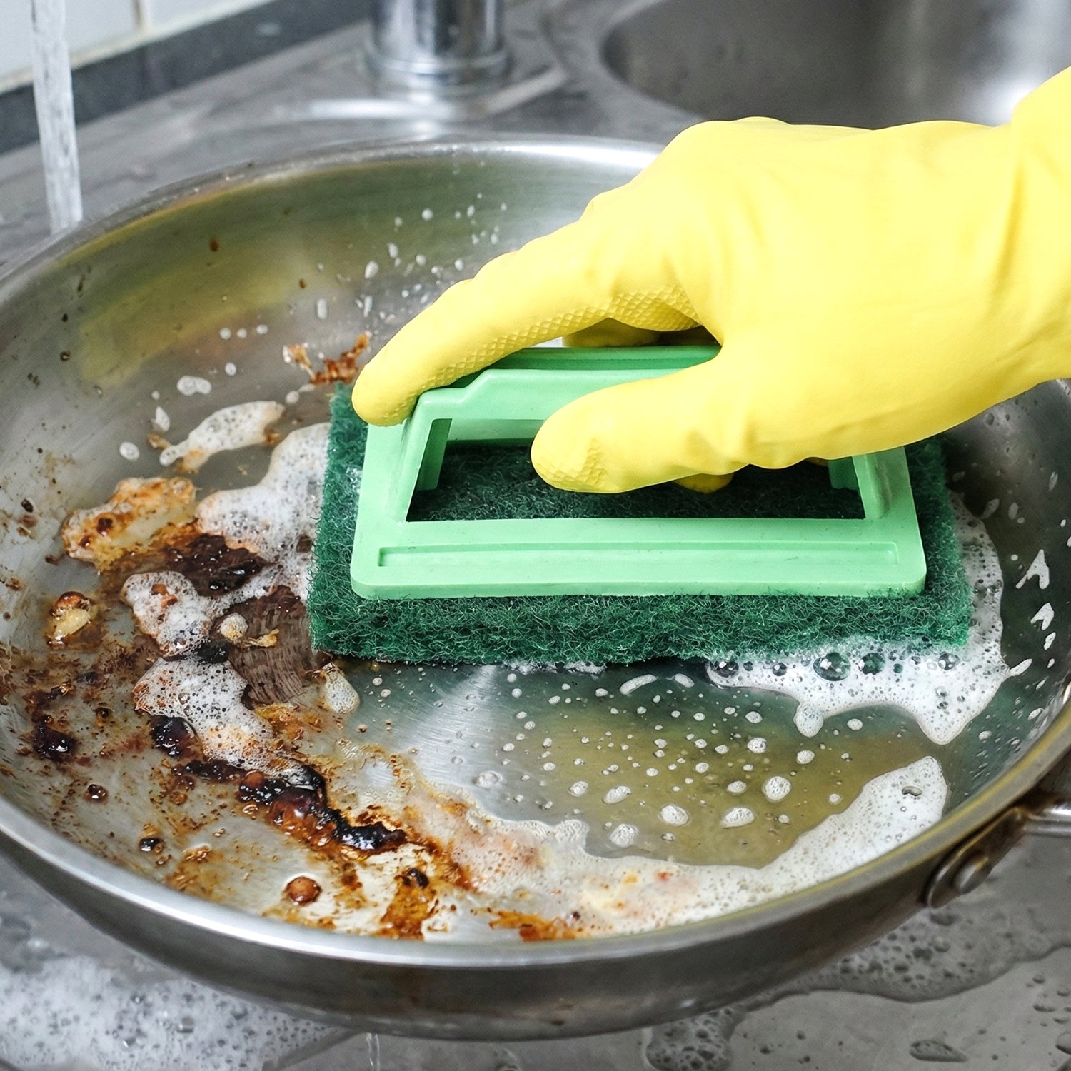 Handle grip of tile scrubber brush showing comfort design