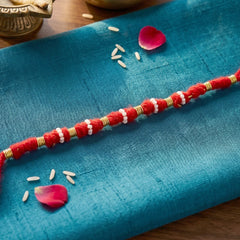 Handmade Red Bracelet Rakhi with White Beads (1 Pc)