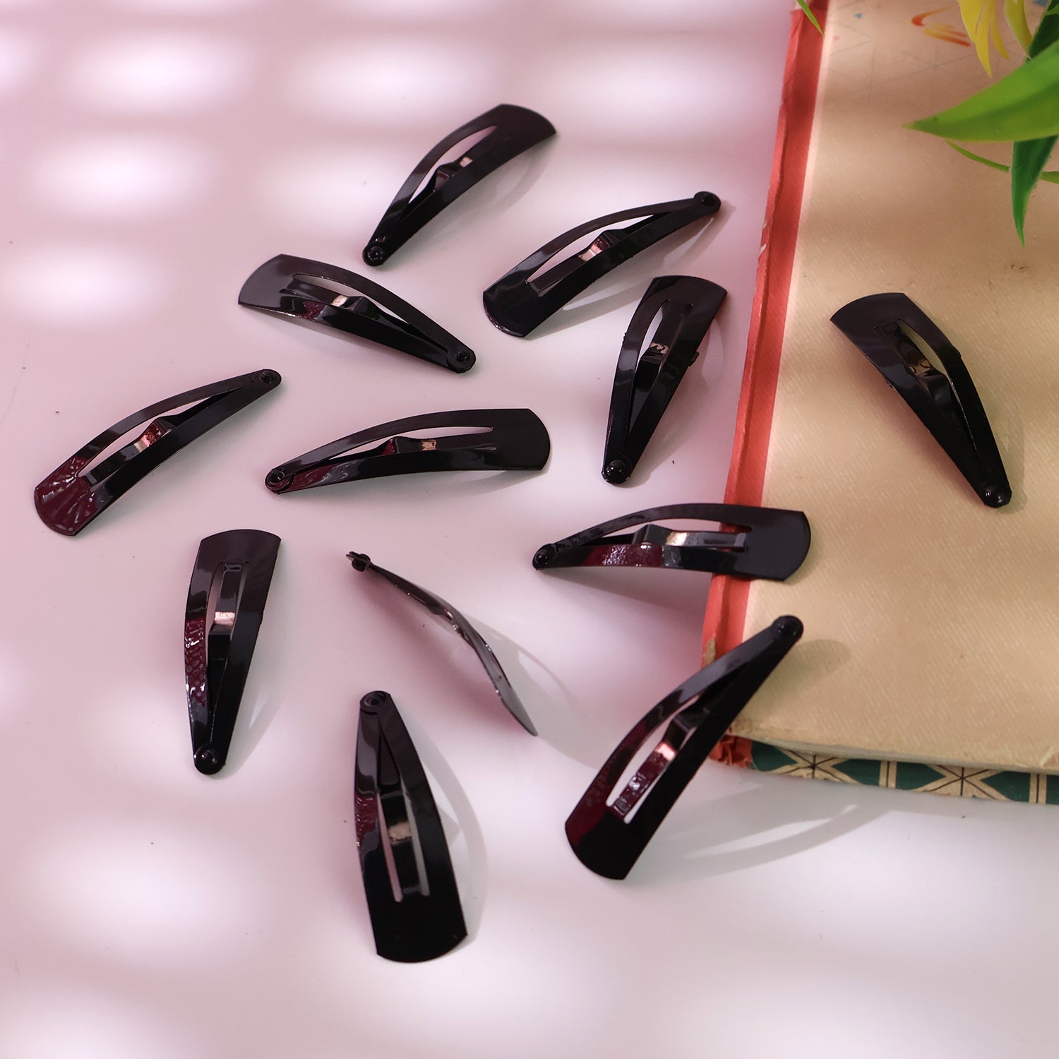 Metal Hair Clips arranged on white background