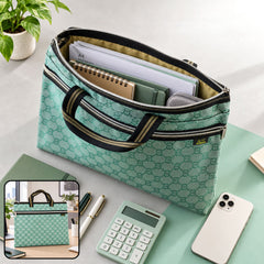 A green patterned document bag with an open zipper, showing papers and a notebook inside, alongside pens and a calculator.