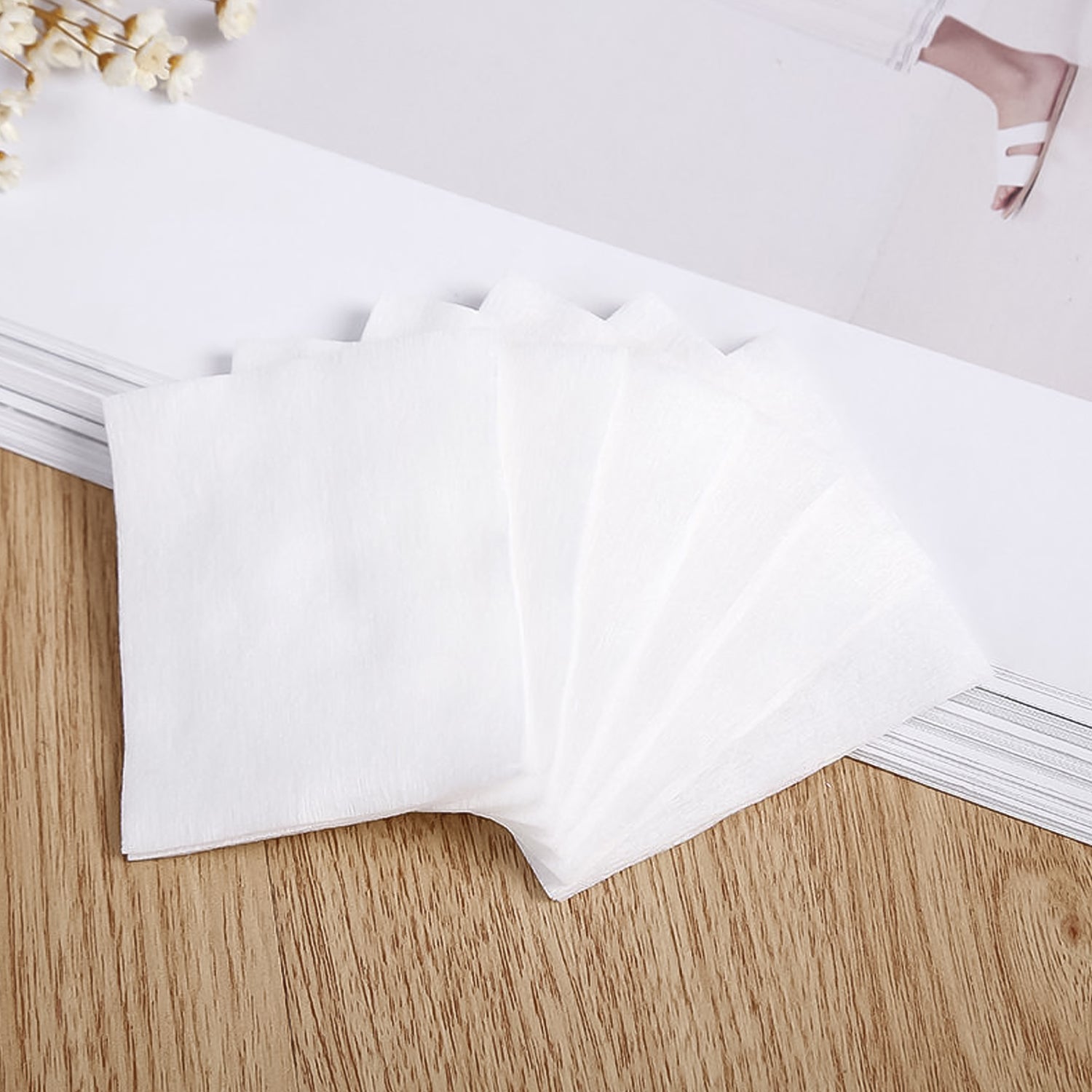Close-up of a single cotton makeup remover pad