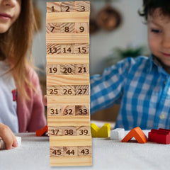 Stacked wooden blocks falling in tumbling tower game