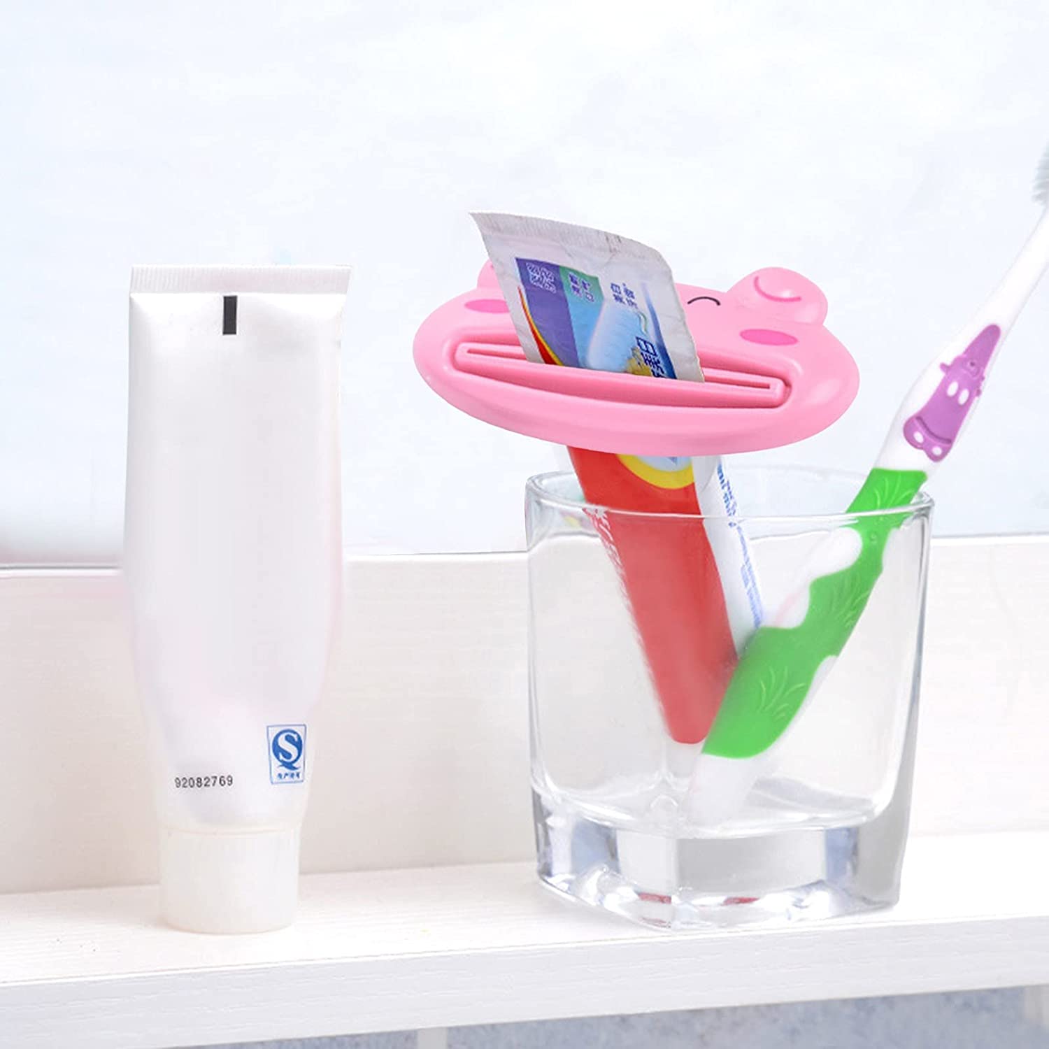 Multifunctional lapdesk with animal toothpaste squeezer nearby