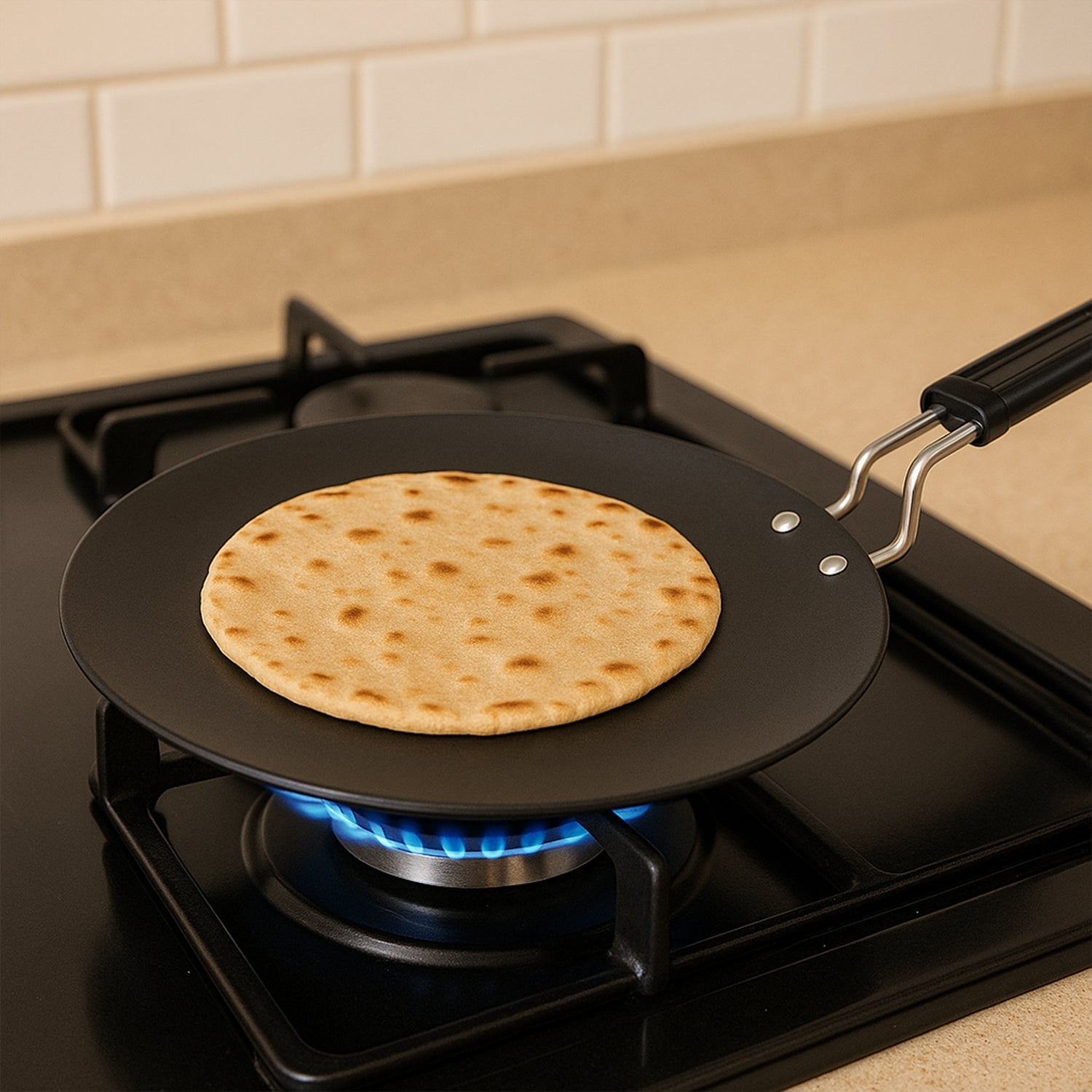 Side view of flat tawa with heat-resistant handle
