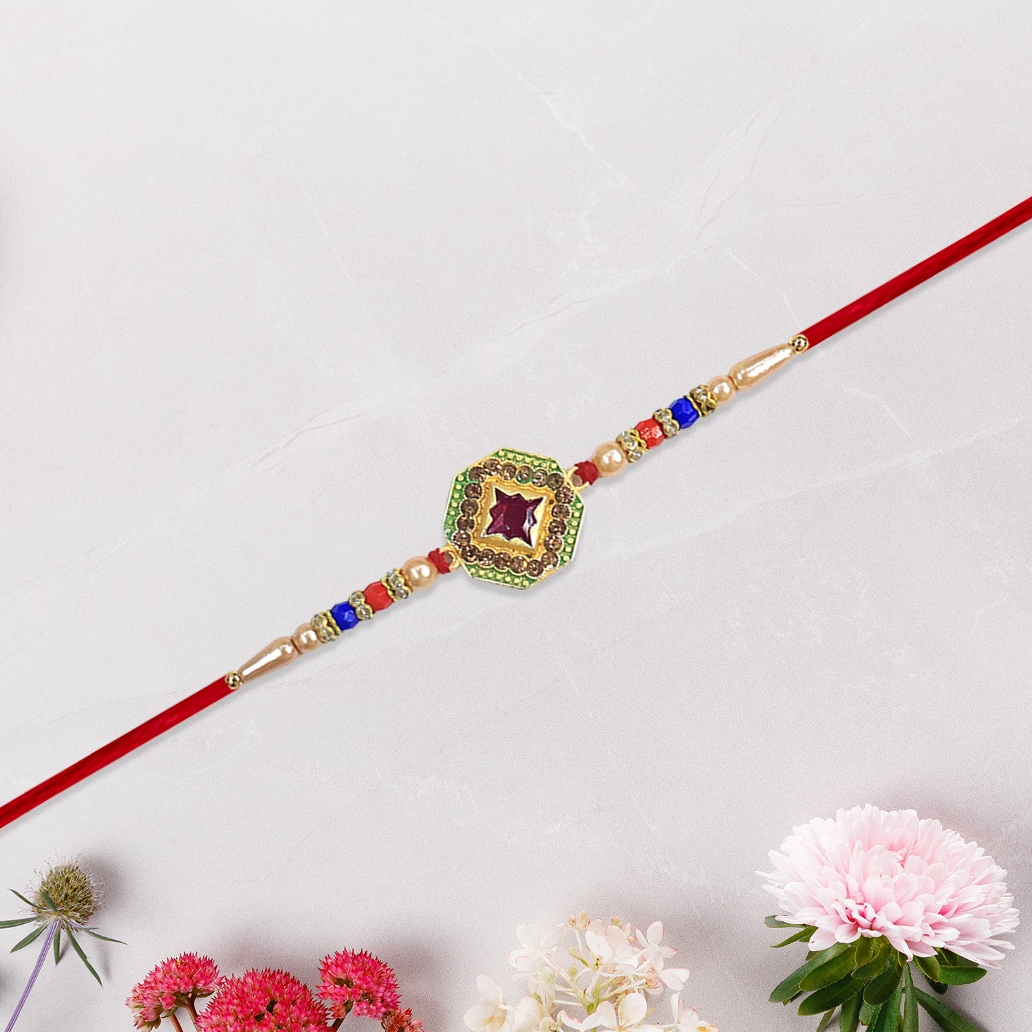 12 Pc Stone Rakhi Set with Red Center Dial, Pearl Beads & Multicolor Accents â€“ Elegant Raksha Bandhan Gift Box for Brothers