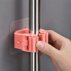 Wall mounted broom mop holder