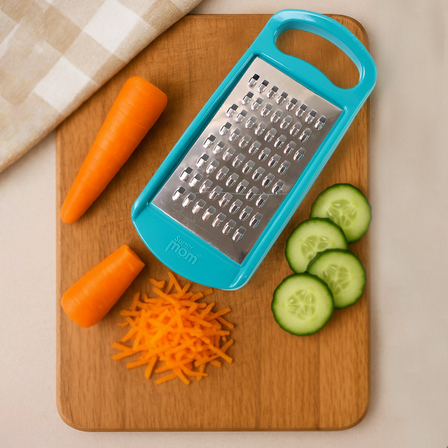 Top view of Supermom cheese grater blade and handle