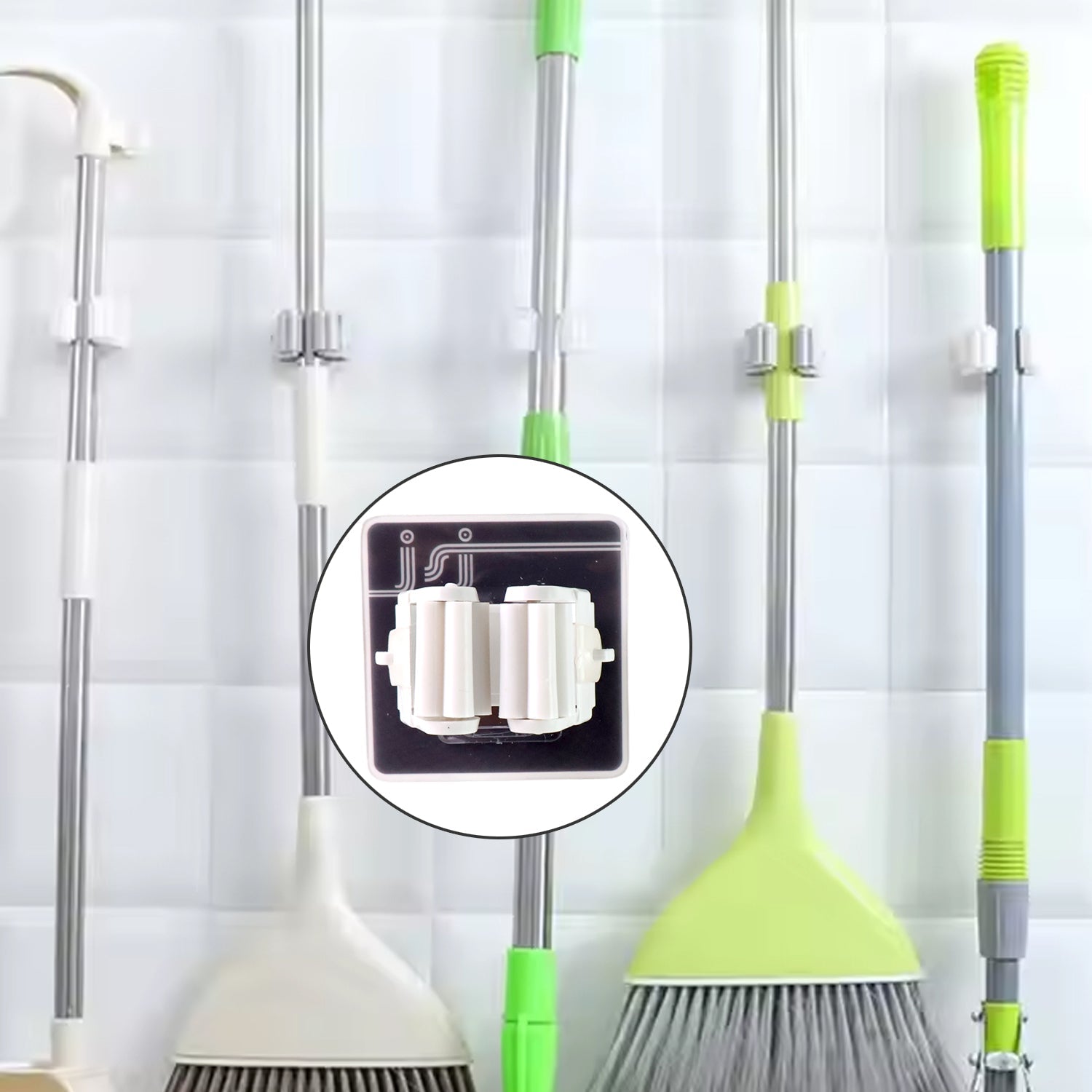 Single wall mounted mop holder securely holding a mop