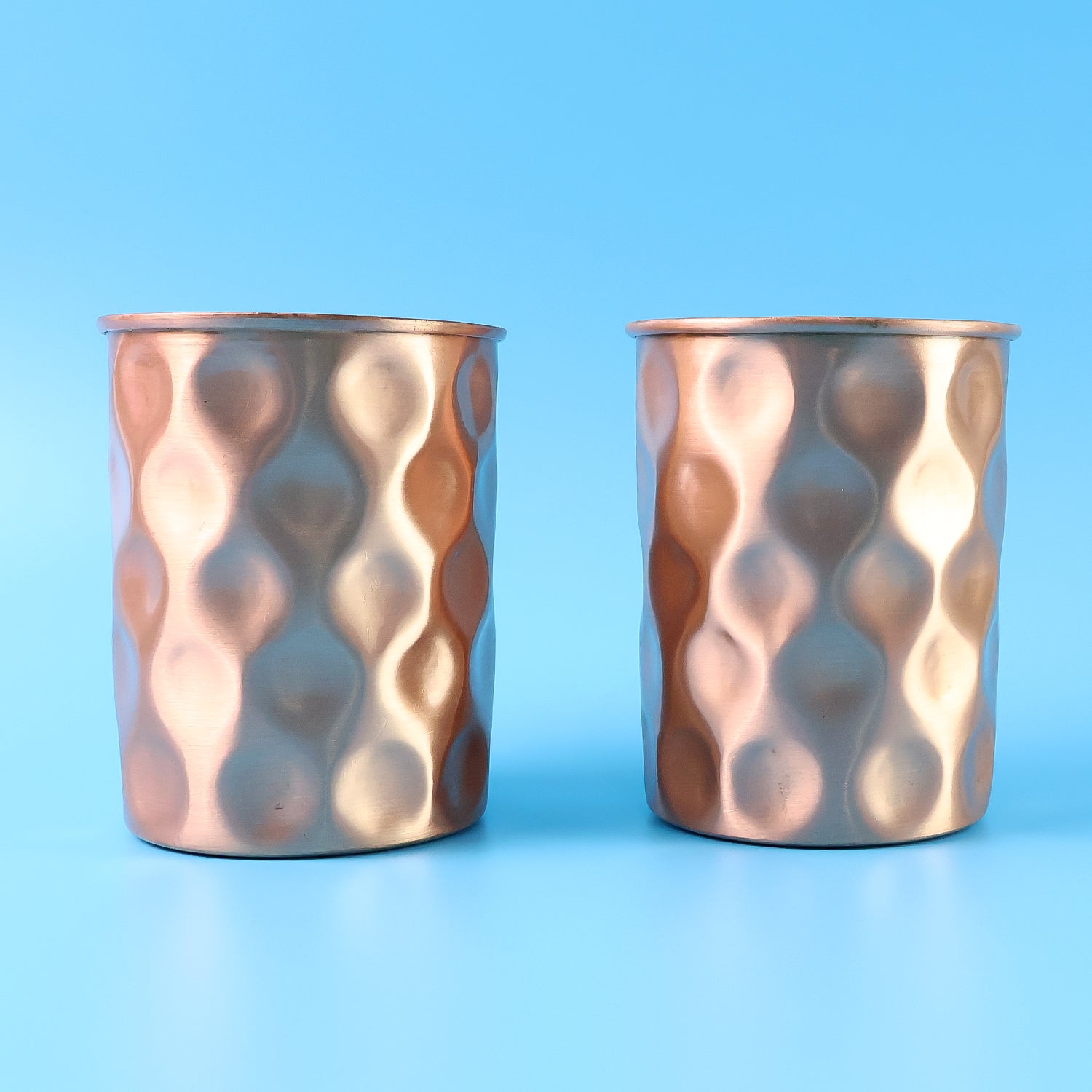 Diamond Cut Copper Bottle & Glasses Set in Lifestyle Setting