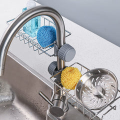 Stainless steel soap and sponge holder caddy on sink