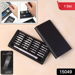 Precision screwdriver set with various interchangeable bits laid out