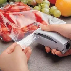 Portable food bag sealer maintaining freshness of snacks.