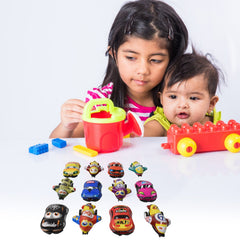 Child's hand playing with a mini pull back toy car