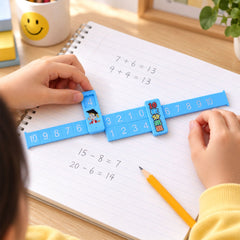 A child's hands hold a blue math ruler with a sliding marker over a spiral notebook displaying arithmetic equations.