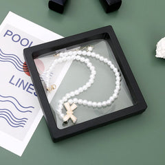 Magnetic lock mechanism on transparent jewellery display box