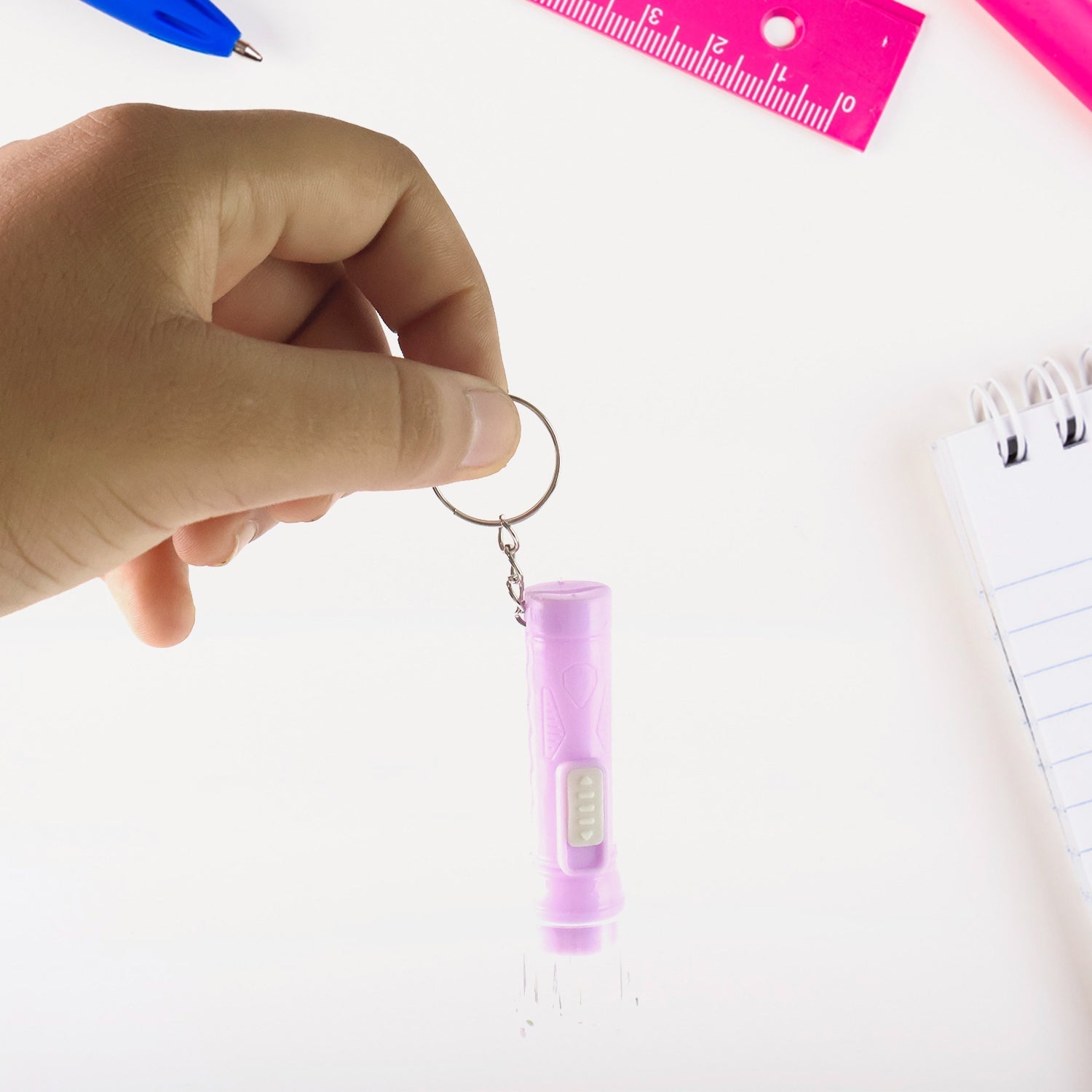 Mini LED Keychain Torch on white background