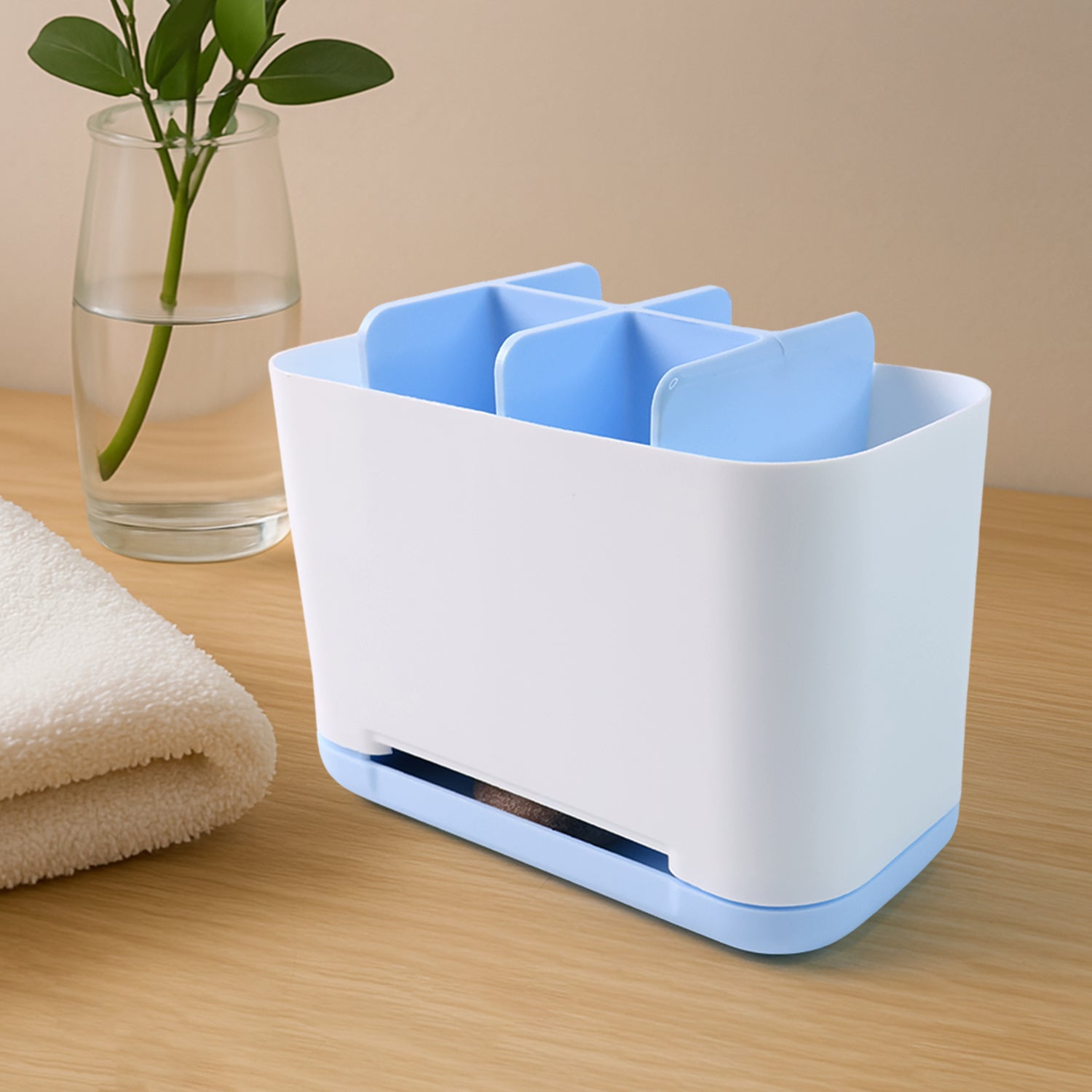 Compact toothbrush organizer holding lotions and creams