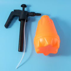 Spray bottle shown with fine mist spray