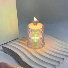 The 4-piece flameless LED candle set illuminates a dark setting, creating a festive atmosphere.