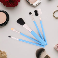 Complete makeup brushes set arranged on white background