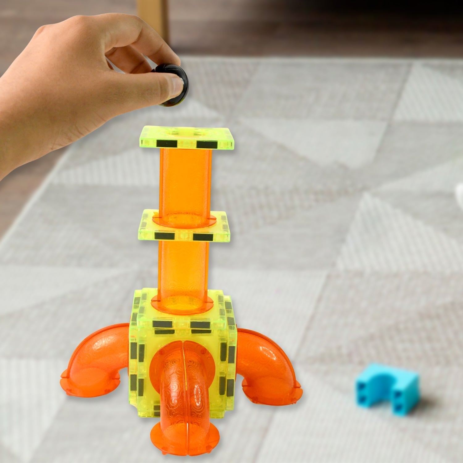 Colorful magnetic marble run construction set in action