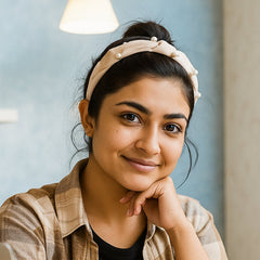 Side profile of a padded women's ribbed knot hairband