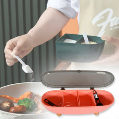 Clear spice box with lid open, revealing four compartments