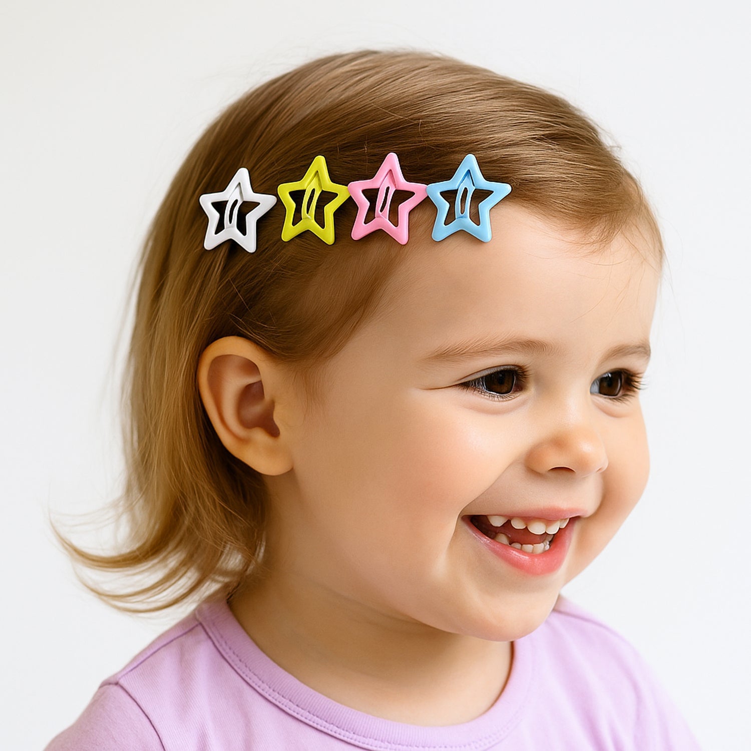 Star shape metal hair clip on wood