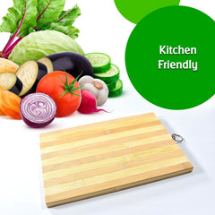 Natural wood cutting board with cheese & grapes
