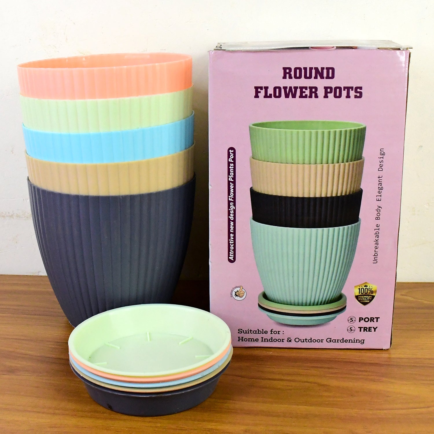 Top view of round plastic flower pots in set