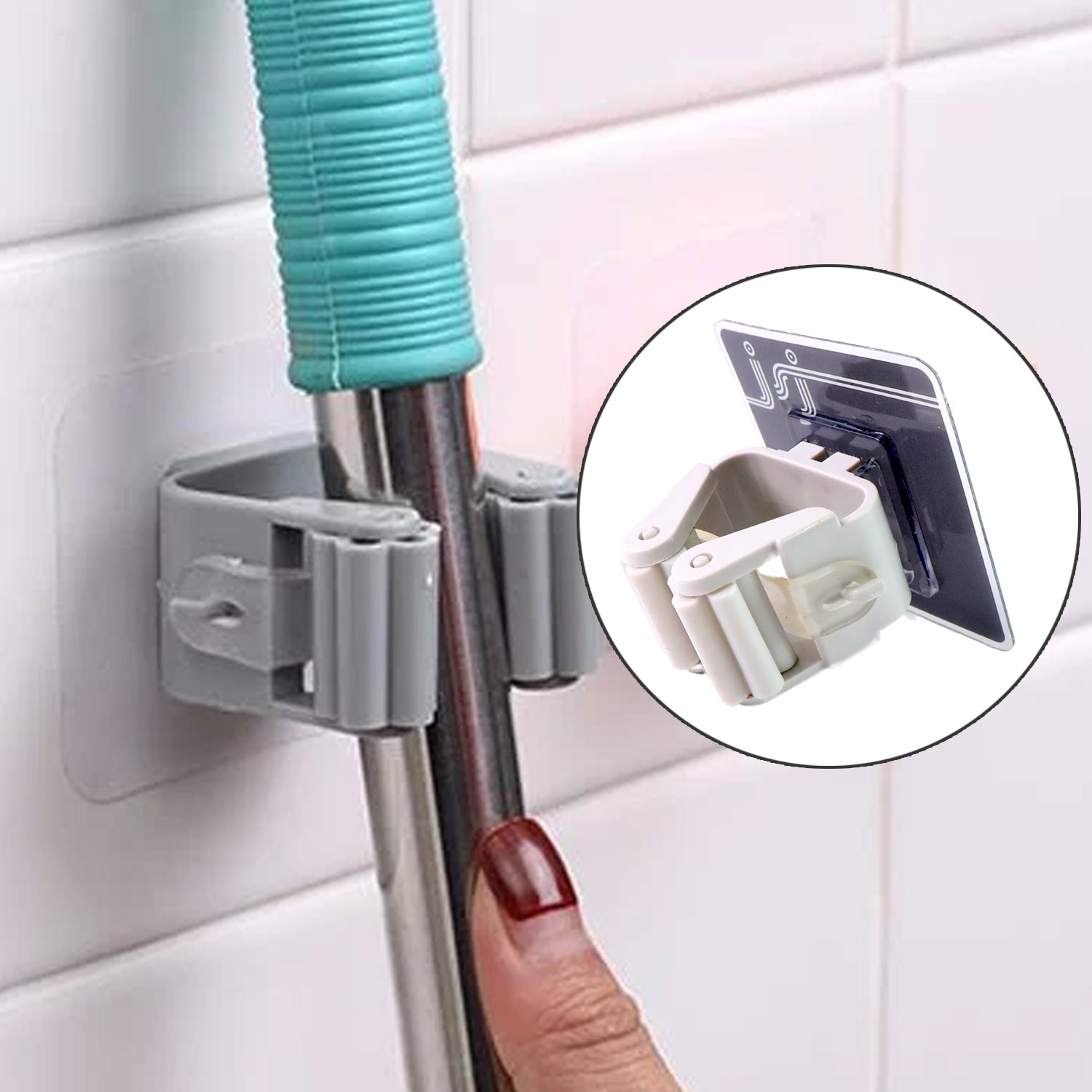 Multiple adhesive mop & broom holders on a wall organizing various tools