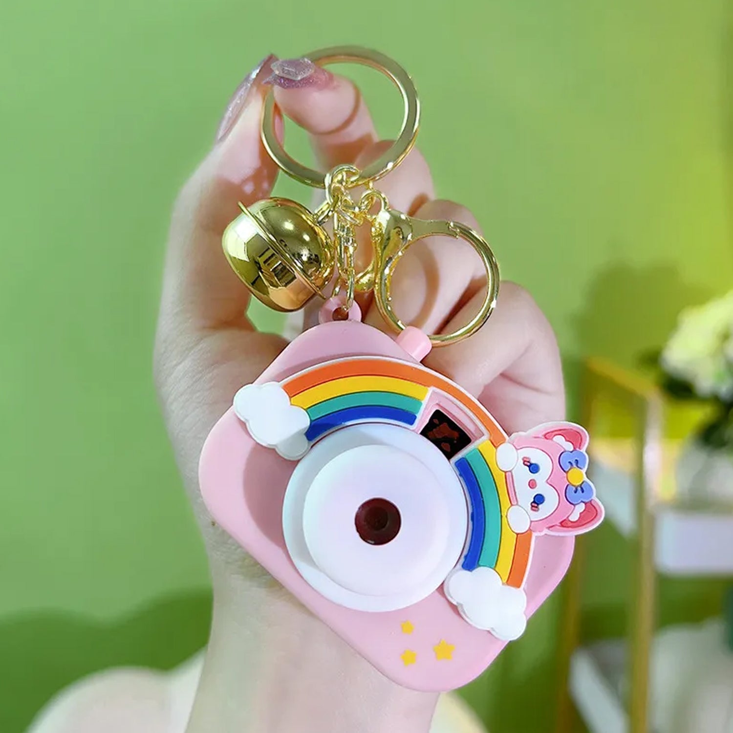 Projective Camera Keychain in different angles on plain background