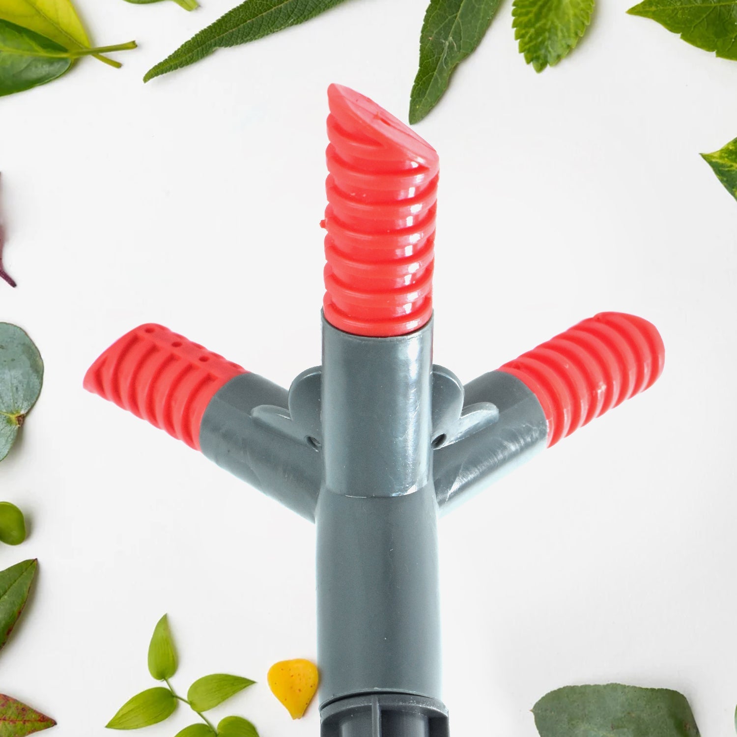 The 360Â° rotating sprinkler arms distributing water evenly across a yard.