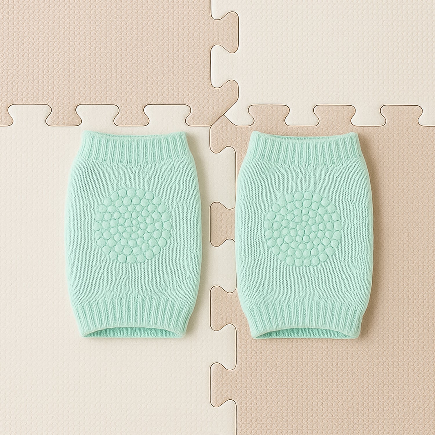Close-up of soft mint green wool leg warmers