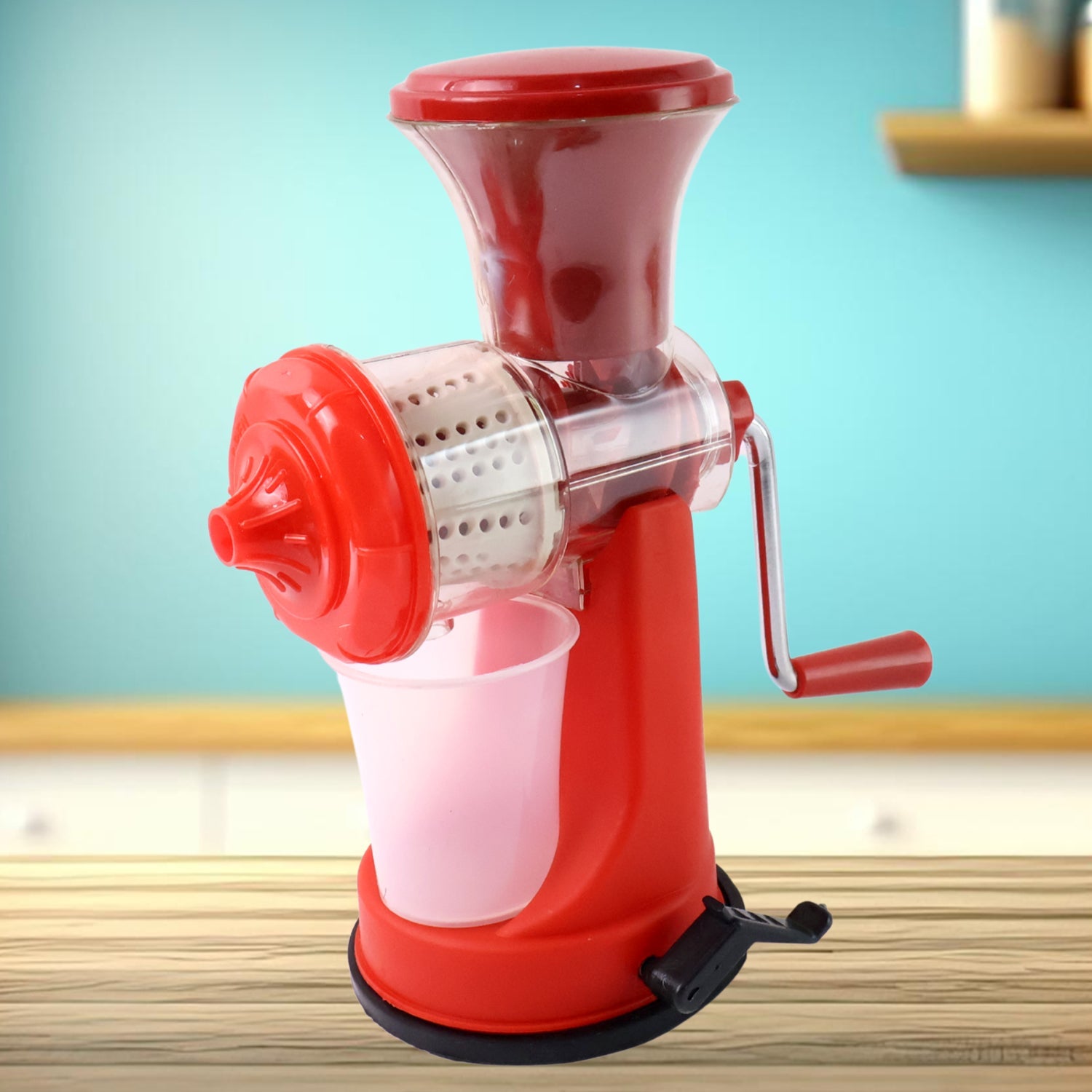 Manual juicer squeezing orange juice