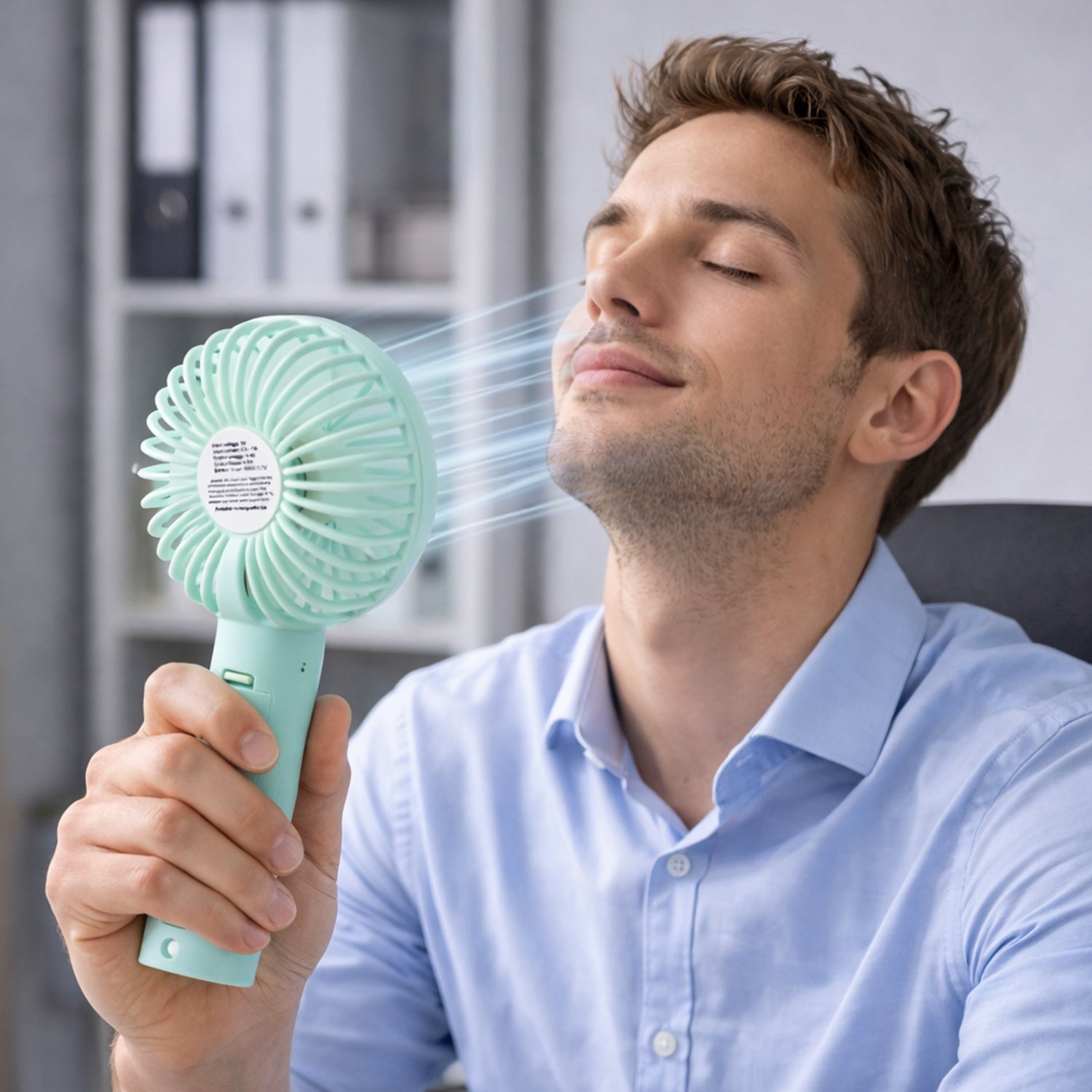 Close-up of handheld fan blades