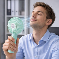 Close-up of handheld fan blades