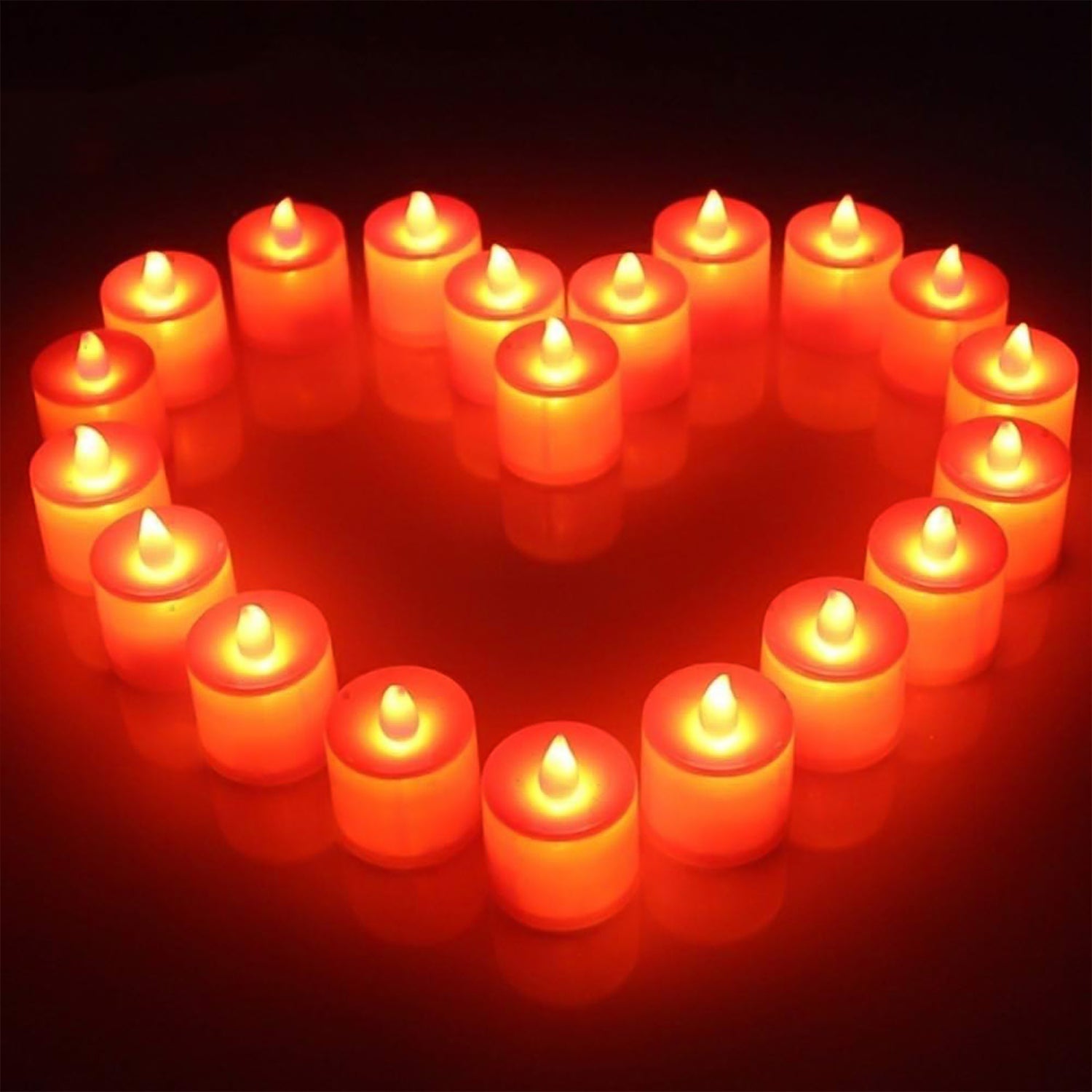 Stack of red LED tea lights, illustrating their compact storage and easy setup.