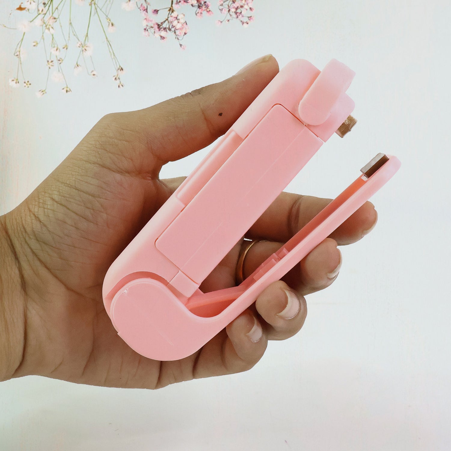Mini Plastic Bag Sealer sealing a bag
