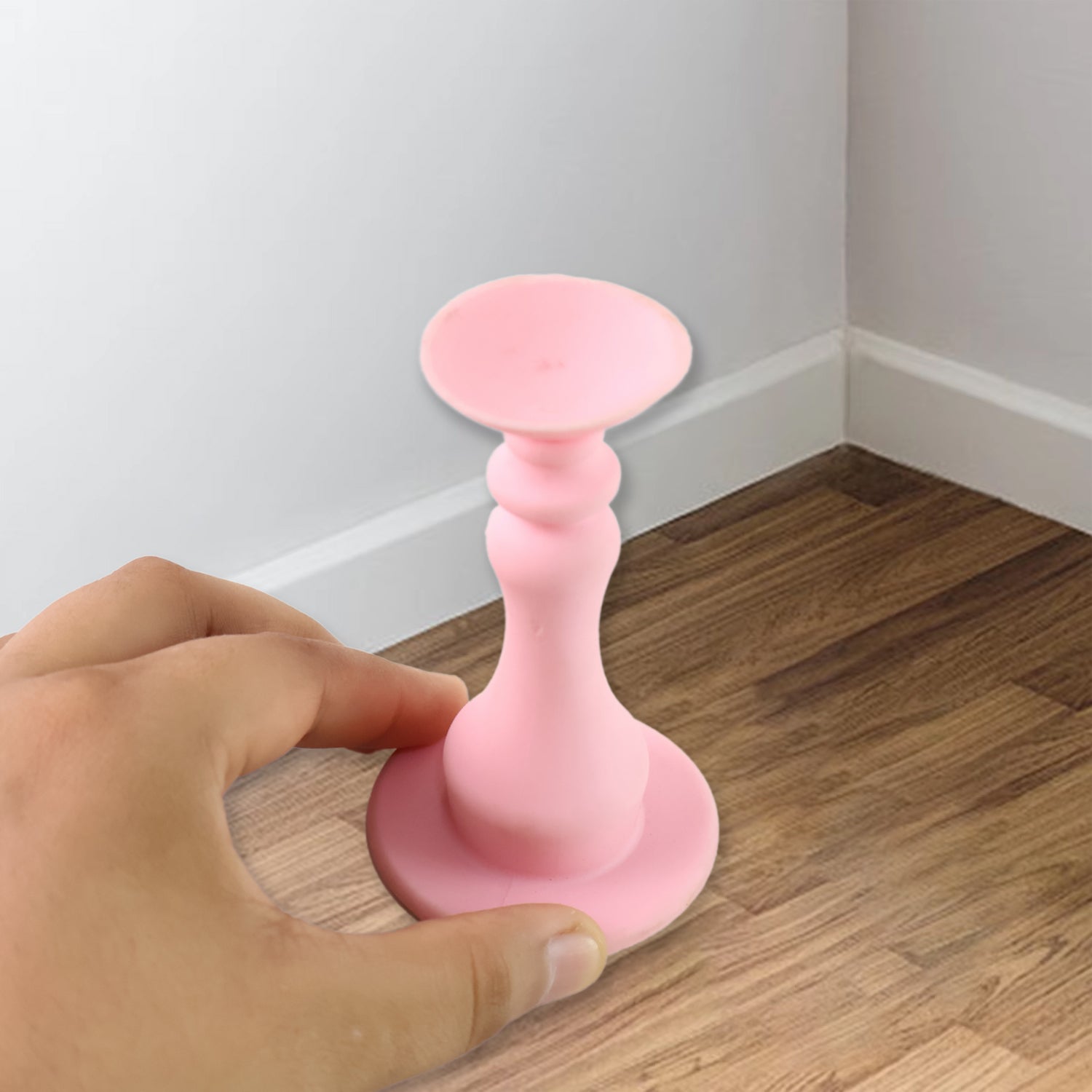 Flexible pink washing machine door stopper