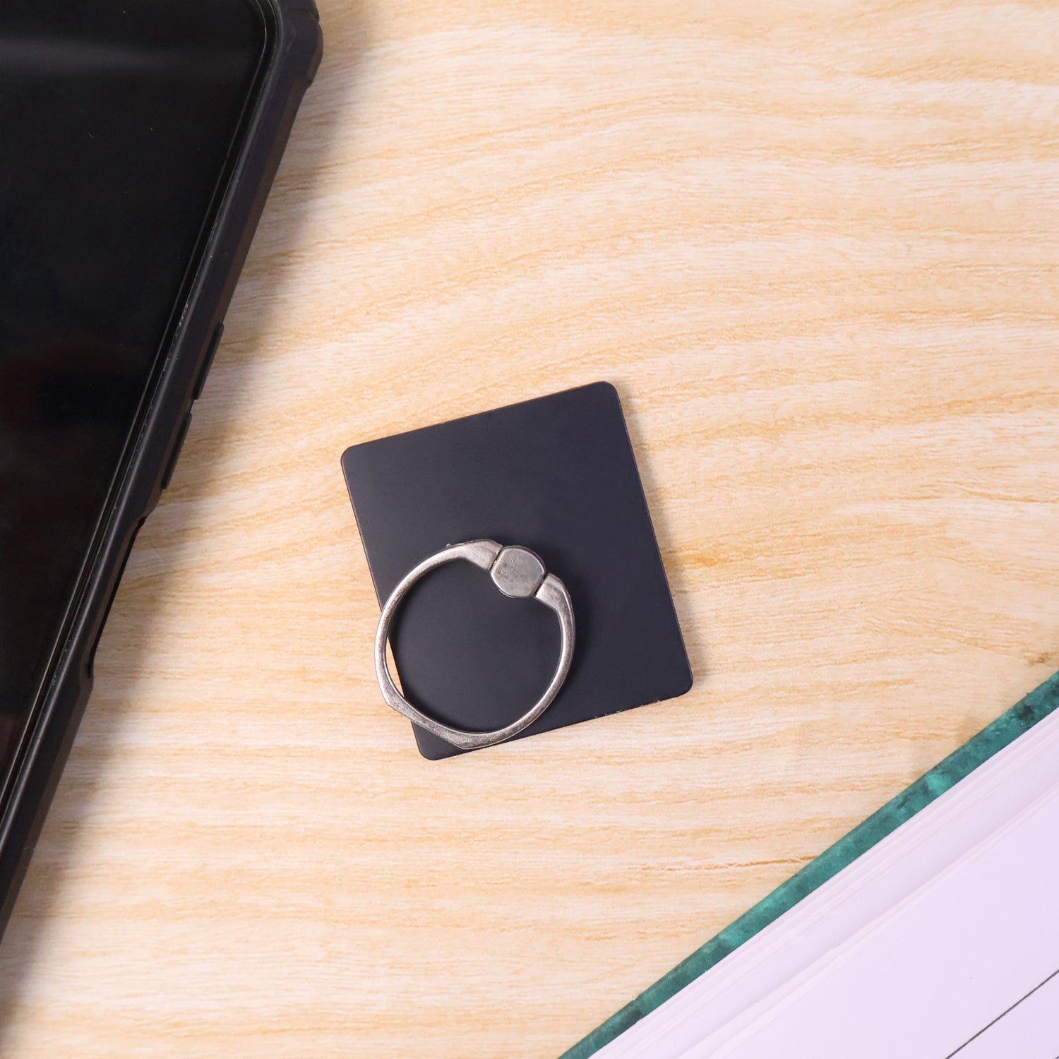 Mobile Phone Finger Ring Stand Holder holding a phone securely