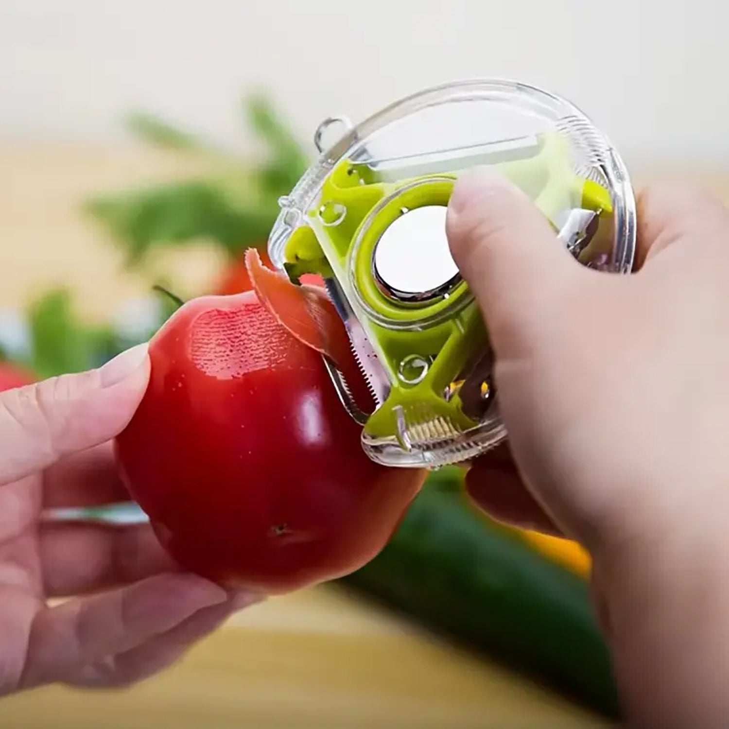 The multi-function peeler being rinsed under water, demonstrating its easy cleaning process.