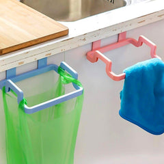 Side clips securing plastic bag on garbage bag holder