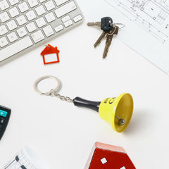 Red metal 'Ring for Wine' bell keychain